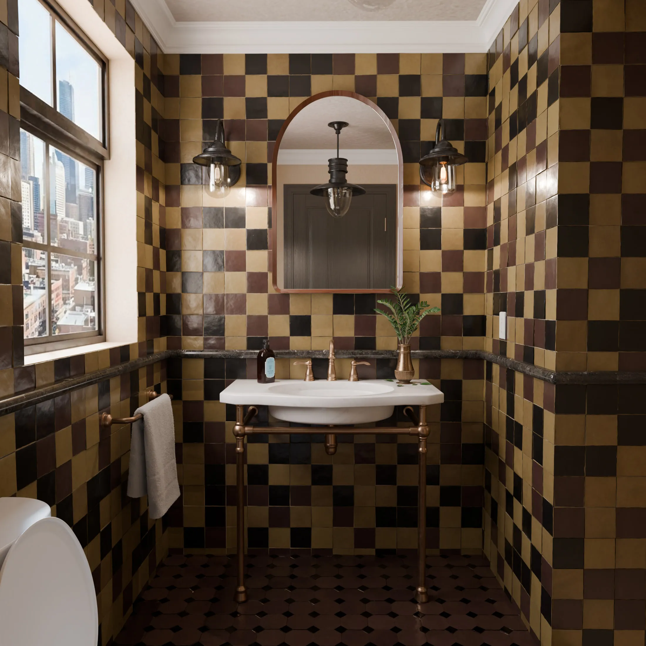 Bathroom tiled floor to ceiling in a checkerboard of olive, black and gold glazed square tiles, with a brass console basin, arched mirror and industrial wall lamps.