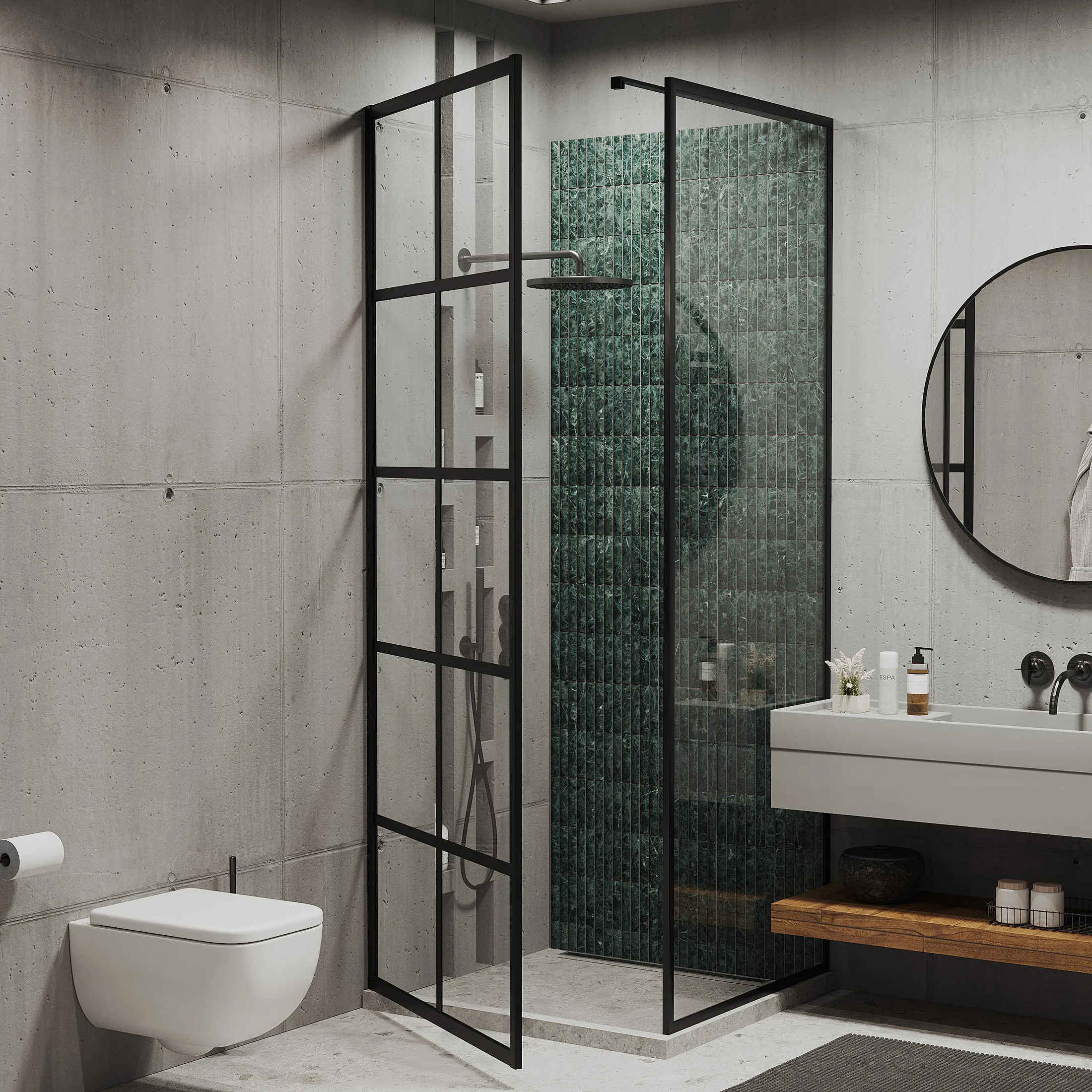 Concrete-look shower room with dark green gloss tile inside a black-framed glass enclosure, a wall-hung basin on a timber shelf and a round black mirror.